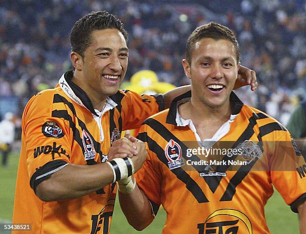 Benji Marshall and Scott Prince of the Tigers celebrate after the round 24 NRL match between Wests Tigers and the Bulldogs at Telstra Stadium on...