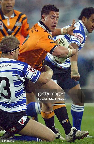 Bronson Harrison of the Tigers in action during the round 24 NRL match between Wests Tigers and the Bulldogs at Telstra Stadium on August 19, 2005 in...