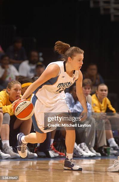 Laurie Koehn of the Washington Mystics drives upcourt during the WNBA game against the Indiana Fever on August 7, 2005 at MCI Center in Washington,...