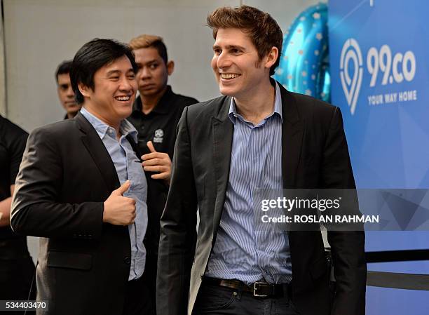Facebook co-founder Eduardo Saverin and Darius Cheung co-founder of BillPin and CEO co-founder of McAfee-acquired tenCube attend the 99.co second...