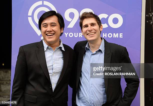 Facebook co-founder Eduardo Saverin and Darius Cheung co-founder of BillPin and CEO co-founder of McAfee-acquired tenCube pose for photograph at the...