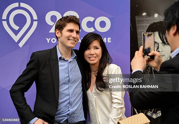 Facebook co-founder Eduardo Saverin and his wife Elaine Andriejanssen attend the 99.co second Anniversary and 99PRO Launch in Singapore on May 26,...