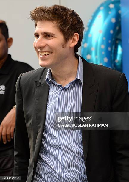 Facebook co-founder Eduardo Saverin attends the 99.co second Anniversary and 99PRO Launch in Singapore on May 26, 2016. / AFP / ROSLAN RAHMAN