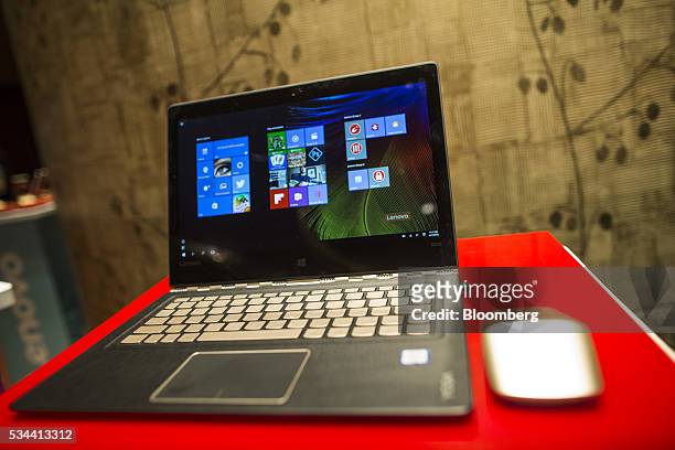 Lenovo Group Ltd. Yoga tablet device sits on display during a news conference in Hong Kong, China, on Thursday, May 26, 2016. Lenovo posted...