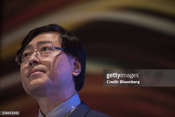 Yang Yuanqing, chairman and chief executive officer of Lenovo Group Ltd., pauses as he speaks during a news conference in Hong Kong, China, on...