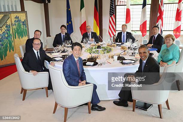 In this handout image provided by Foreign Ministry of Japan, Japanese Prime Minister Shinzo Abe, U.S. President Barack Obama, German Chancellor...
