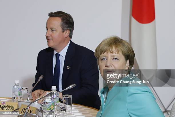 British Prime Minister David Cameron and German Chancellor Angela Merkel attend the Japan EU EPA/FTA meeting on May 26, 2016 in Kashikojima, Japan....
