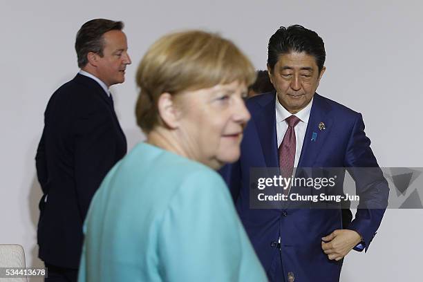 British Prime Minister David Cameron, German Chancellor Angela Merkel and Japanese Prime Minister Shinzo Abe attend the Japan EU EPA/FTA meeting on...