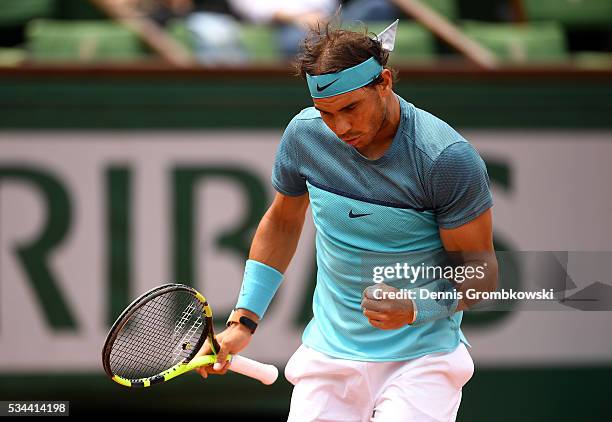 Rafael Nadal of Spain reacts during the Men's Singles second round match against Facundo Bagnis of Argentina on day five of the 2016 French Open at...