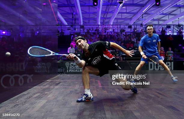 Simon Rosner of Germany competes against Cameron Pilley of Australia during day three of the PSA Dubai World Series Finals 2016 at Burj Park on May...