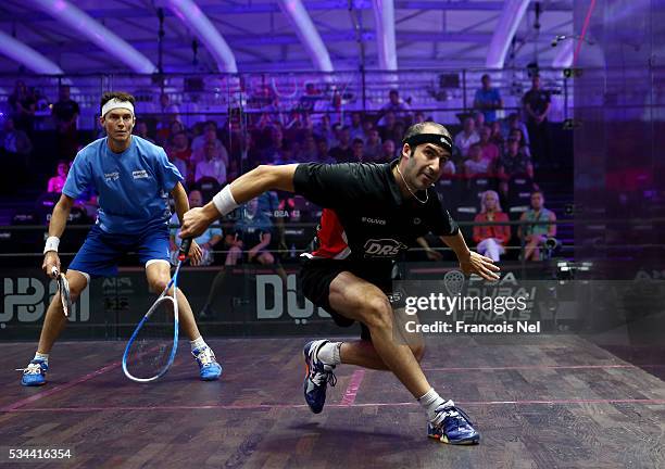 Simon Rosner of Germany competes against Cameron Pilley of Australia during day three of the PSA Dubai World Series Finals 2016 at Burj Park on May...