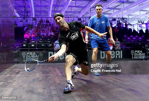 Simon Rosner of Germany competes against Cameron Pilley of Australia during day three of the PSA Dubai World Series Finals 2016 at Burj Park on May...