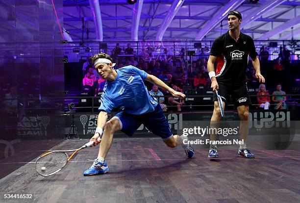 Cameron Pilley of Australia competes against Simon Rosner of Germanyduring day three of the PSA Dubai World Series Finals 2016 at Burj Park on May...