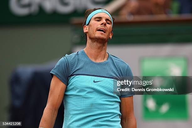 Rafael Nadal of Spain reacts during the Men's Singles second round match against Facundo Bagnis of Argentina on day five of the 2016 French Open at...