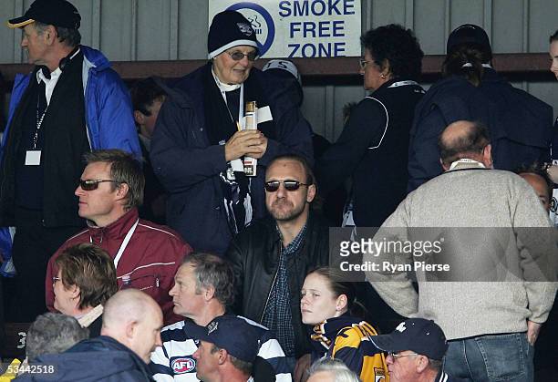 Former Geelong player Gary Ablett watches on during the round twenty one AFL match between the Geelong Cats and the West Coast Eagles at Skilled...