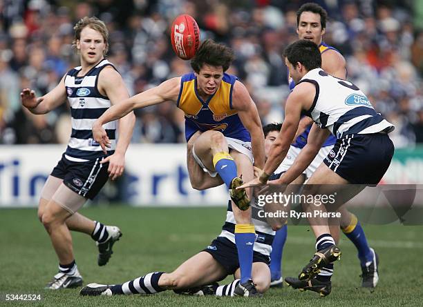 Rowan Jones for the Eagles kicks clear during the round twenty one AFL match between the Geelong Cats and the West Coast Eagles at Skilled Stadium on...