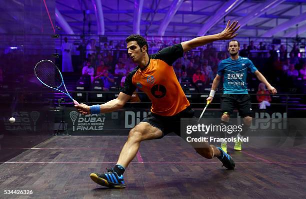 Omar Mosaad of Egypt competes against Gregory Gaultier of France during day three of the PSA Dubai World Series Finals 2016 at Burj Park on May 26,...