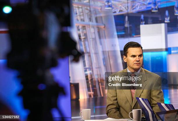 Paul Hickey, co-founder of Bespoke Investment Group LLC, listens during a Bloomberg Television interview in New York, U.S., on Thursday, May 26,...