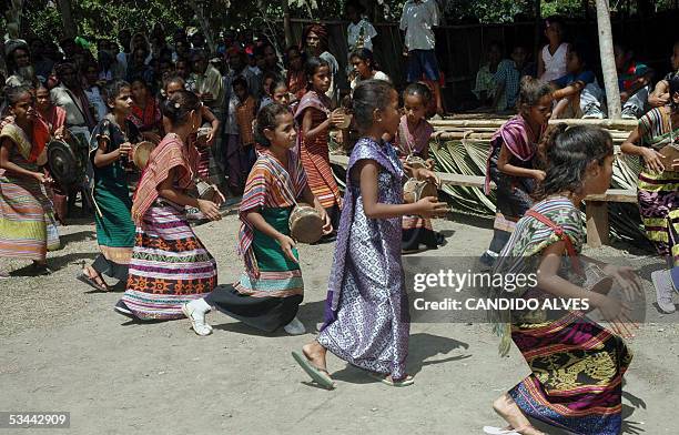 East Timorese girls perform a traditional dance during the 30th founding anniversary celebration of Falintil in Manatuto, 20 August 2005. The...