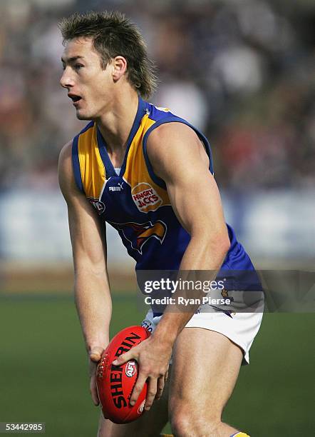 Adam Hunter for the Eagles in action during the round twenty one AFL match between the Geelong Cats and the West Coast Eagles at Skilled Stadium on...