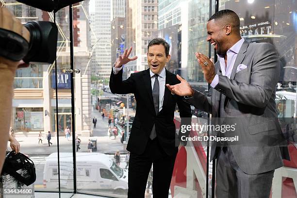 Calloway interviews Dan Harris during his visit to "Extra" at their New York studios at H&M in Times Square on May 26, 2016 in New York City.