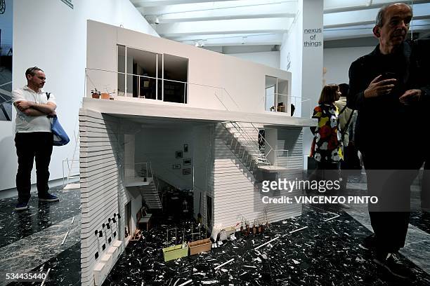 Picture shows appartments projects in Japan's pavillion, during the opening of the 15th International Architecture Exhibition in Venice on May 26,...