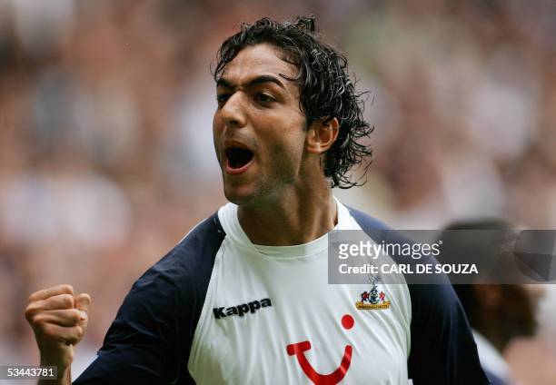 London, UNITED KINGDOM: Tottenham's Mido celebrates his goal against Middlesborough in their Premiership football match 20 August 2005 in London. AFP...