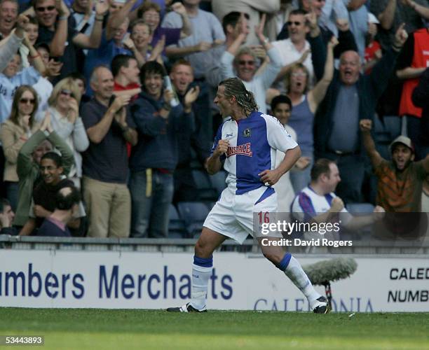 Tugay of Blackburn Rovers celebrates after scoring the winning goal during the Barclays Premiership match between Blackburn Rovers and Fulham at...