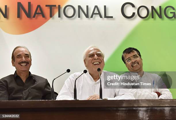 Senior Congress leaders Kapil Sibal and Ghulam Nabi Azad during a press conference on the completion of two years of BJP-led government at AICC HQ on...