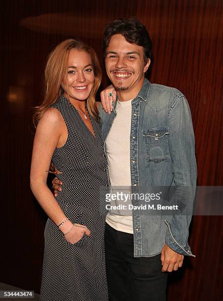 Lindsay Lohan and Egor Tarabasov attend a private screening with Alice Temperley of Disney's Alice Through The Looking Glass at the Bulgari Hotel on...