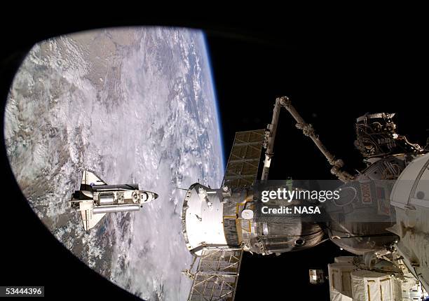 In this undated handout photo the Space Shuttle Discovery is seen from the International Space Station during rendezvous and docking operations.