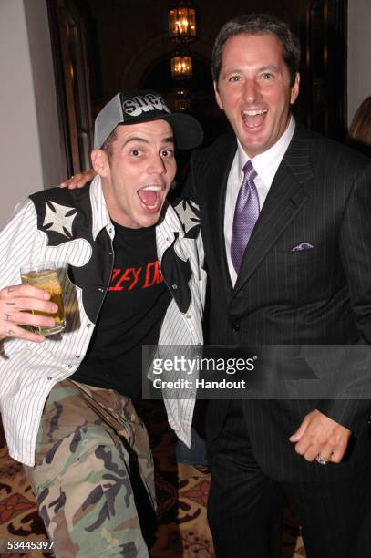 In this handout from International Pool Tour, actor Steve-O and writer Kevin Trudeau are seen at the pre-party for the International Pool Tour World...