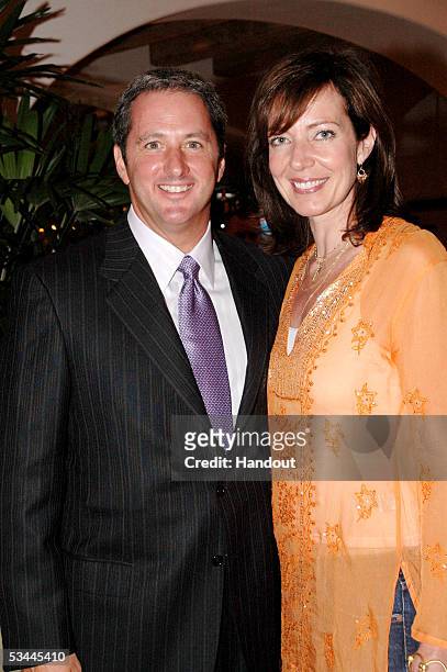 In this handout from International Pool Tour, writer Kevin Trudeau and actress Allison Janney are seen at the pre-party for the International Pool...