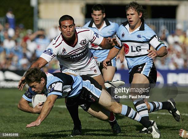 Brett Kimmorley of the Sharks in action during the Round 24 match between the Cronulla-Sutherland Sharks and the Manly Warringah Sea Eagles atToyota...