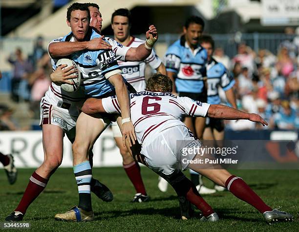 David Simmons of the Sharks in action during the Round 24 match between the Cronulla-Sutherland Sharks and the Manly Warringah Sea Eagles atToyota...
