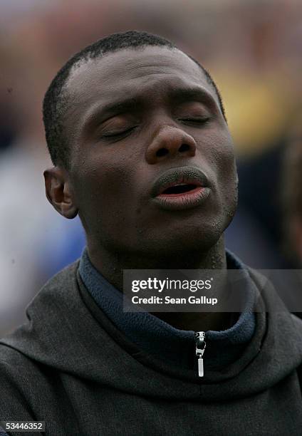 Priest from France attends the final mass with Pope Benedict XVI at World Youth Day August 21, 2005 at Marienfled outside Cologne, Germany. An...