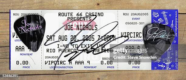Autographed concert ticket and custom guitar picks from country singer Joe Nichols' performance at Route 66 Legends Theater on August 20, 2005 in...