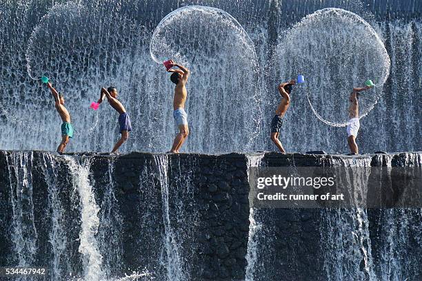 fun with friends - waterfall jump stock pictures, royalty-free photos & images
