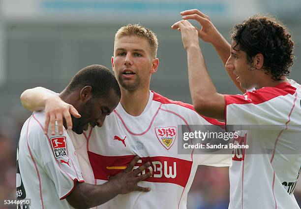Cacao of Stuttgart celebrates the sixth goal with his team mates Thomas Hitzlsperger and Mario Carevic during the DFB German Cup match between TSG...