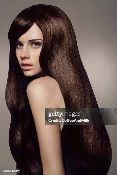 young beautiful woman - shiny straight hair stock pictures, royalty-free photos & images