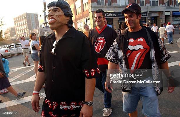 Concert goers Paul DeFilippo, Rick Hamilton, and Joe DiRico dress for the occasion on opening night of the Rolling Stones "A Bigger Bang" tour August...
