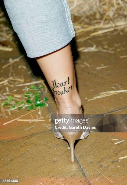 Jodie Marsh shows off her new tattoo at the after party for the UK Premiere of "The Dukes Of Hazzard" at the Texas Embassy Cantina on August 22, 2005...