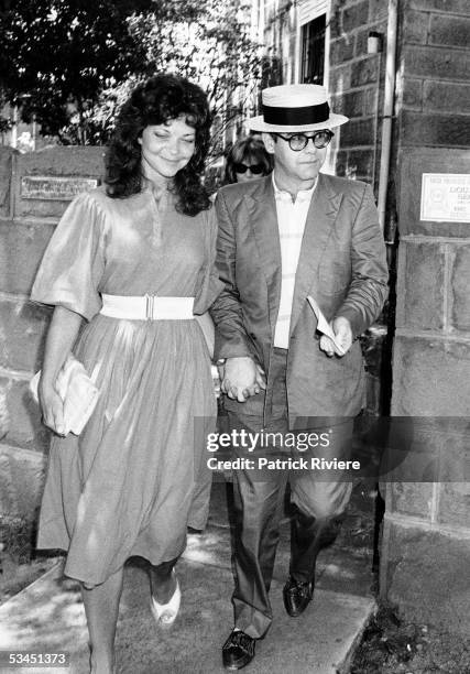 Renate Blauel and singer Elton John are seen outside St Mark's rectory two days before their wedding February 12, 1984 in Sydney, Australia.
