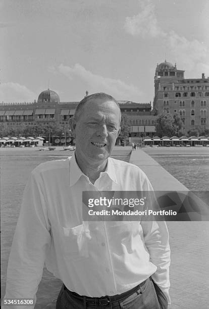 American writer Erskine Caldwell at the beach along the Lido during the 19th Venice International Film Festival. Venice, August 1958