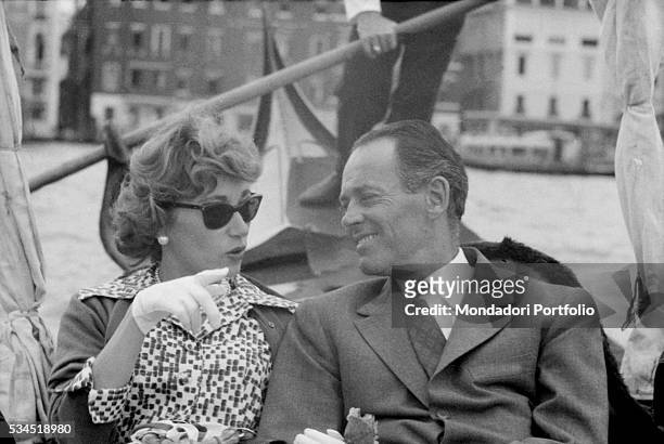 American actor Henry Fonda and his wife, Italian baroness Afdera Franchetti, in a gondola during the XVIII Venice International Film Festival....
