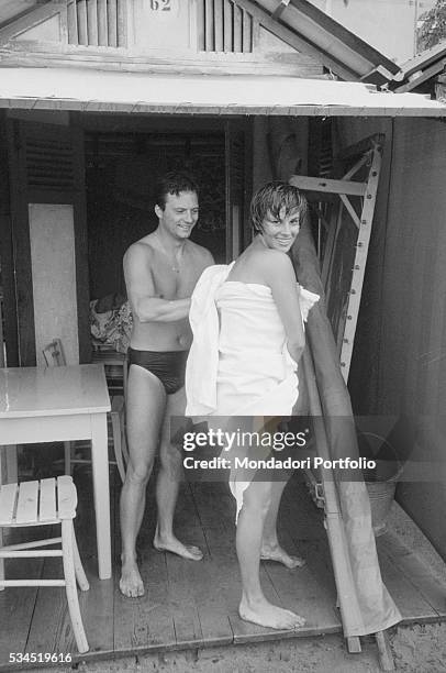 Italian actor Franco Interlenghi and his wife, Italian actress Antonella Lualdi , drying on the beach during the XVIII Venice International Film...