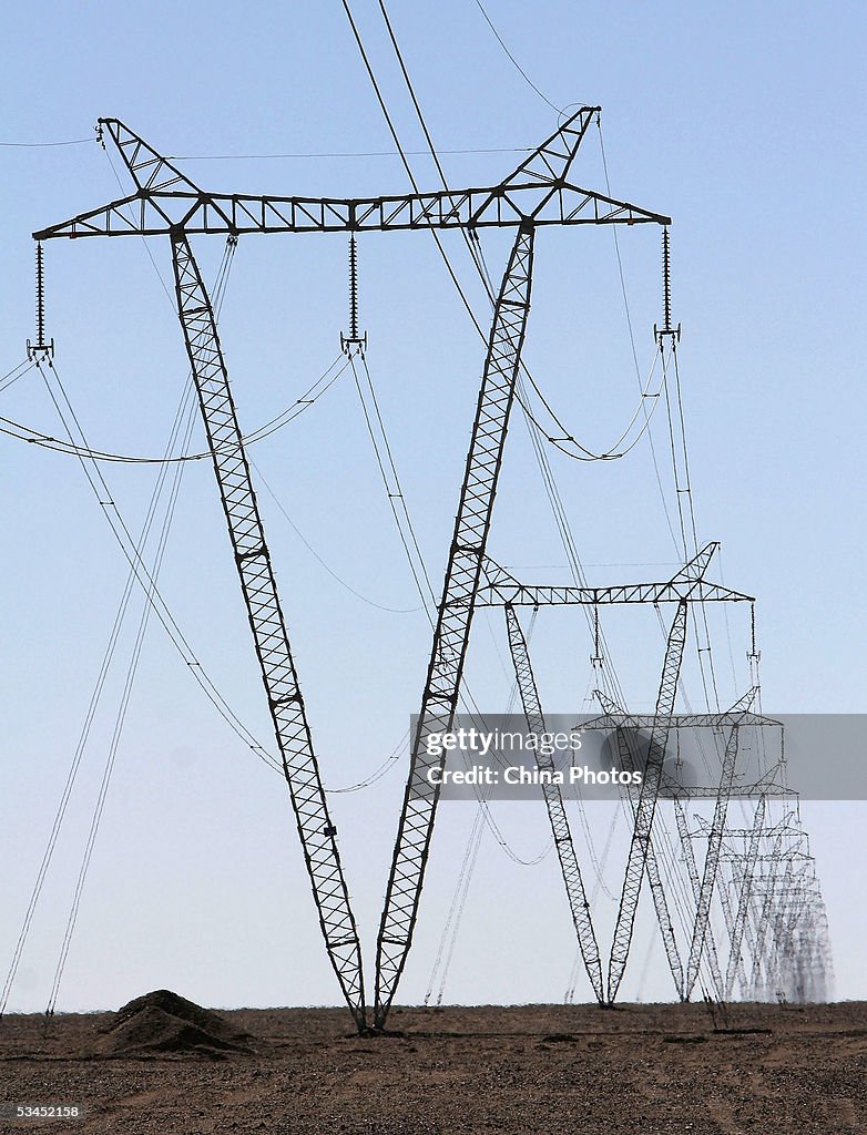 Power Transmission Towers At State Highway In Northwest China