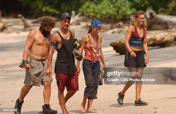Castaways Rupert Boneham, Rob Mariano, Amber Brkich and Jenna Lewis of the Chaboga Mogo tribe during the final episode. Image dated December 10, 2003.