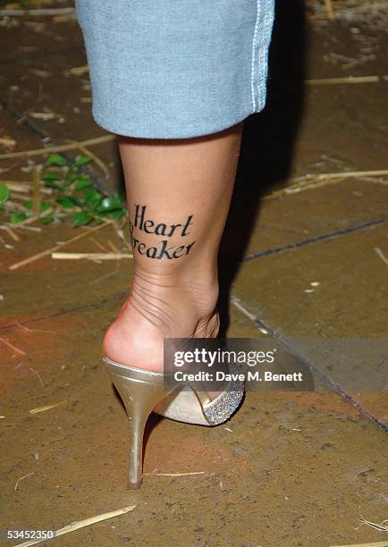 Jodie Marsh shows off her new tattoo at the after party for the UK Premiere of "The Dukes Of Hazzard" at the Texas Embassy Cantina on August 22, 2005...