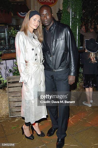 Fashion Designer Ozwald Boeteng and wife Gyunel attend the after party for the UK Premiere of "The Dukes Of Hazzard" at the Texas Embassy Cantina on...